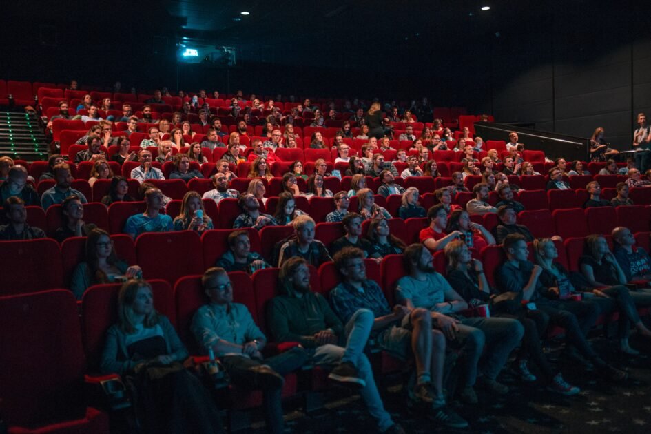 people watching movie in a theatre