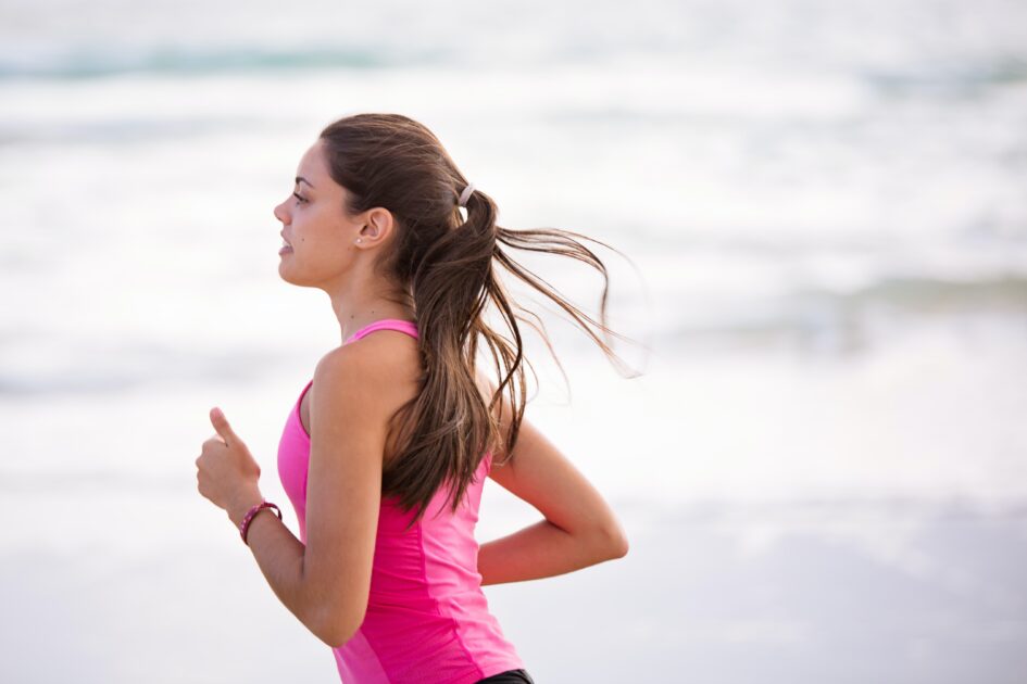 Girl with pink t-shirt jogging