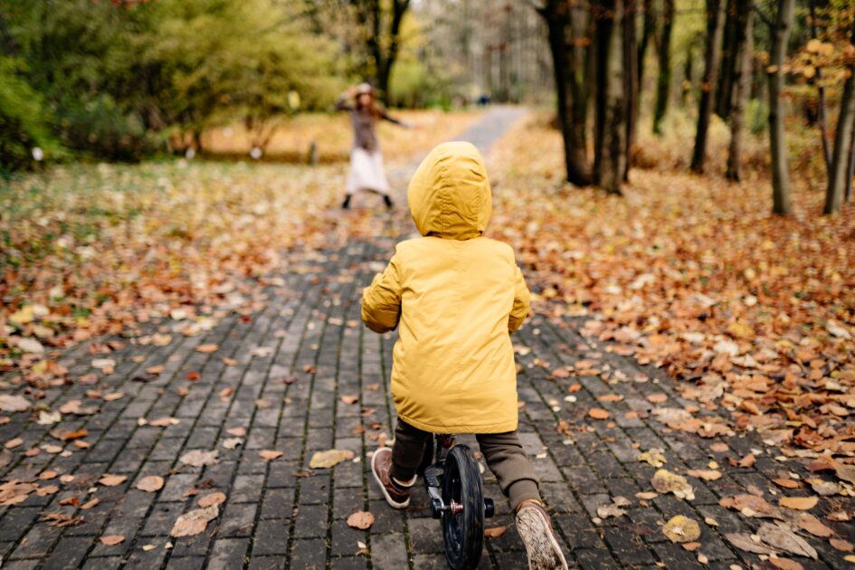 A kid is riding a bicycle